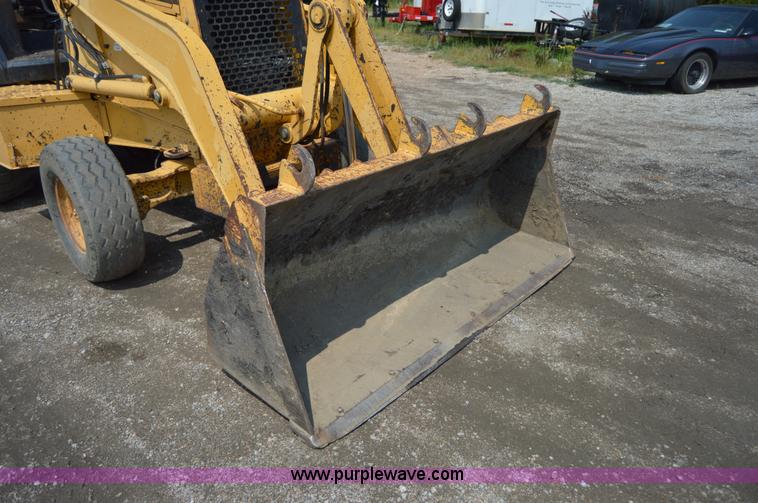 image for item H2828 1999 John Deere 310E backhoe