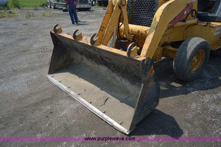 image for item H2828 1999 John Deere 310E backhoe