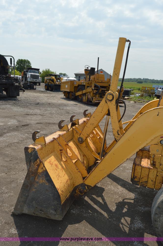 image for item H2828 1999 John Deere 310E backhoe