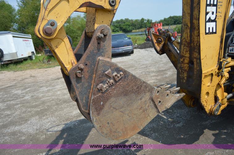 image for item H2828 1999 John Deere 310E backhoe