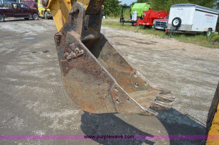 image for item H2828 1999 John Deere 310E backhoe