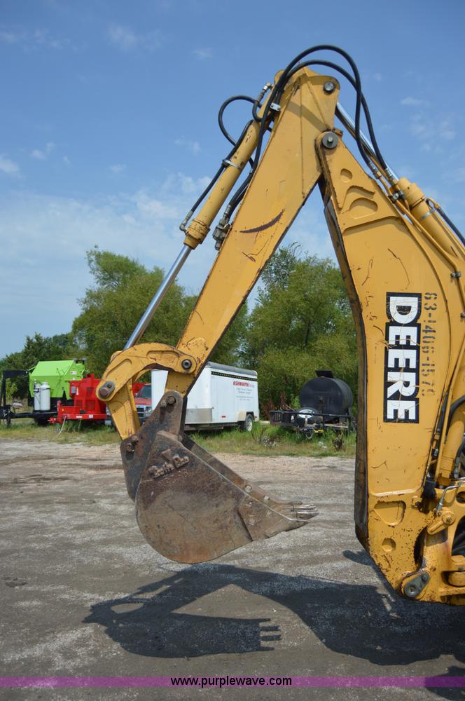 image for item H2828 1999 John Deere 310E backhoe