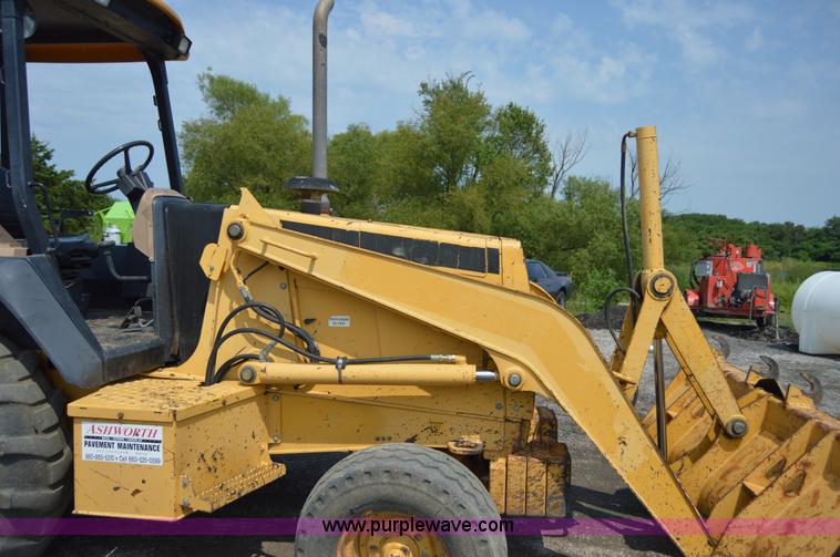 image for item H2828 1999 John Deere 310E backhoe