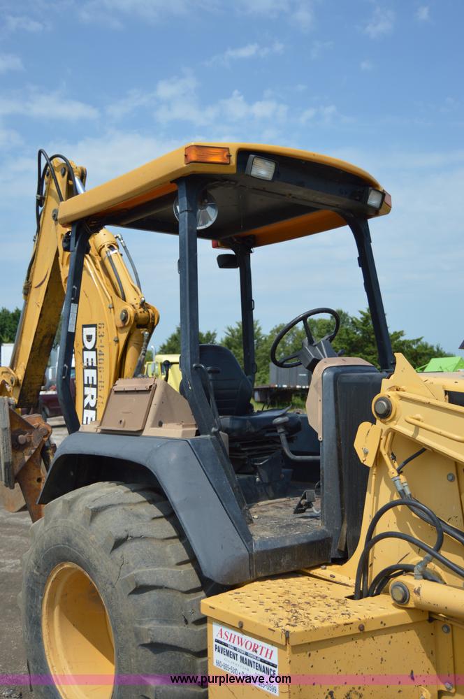 image for item H2828 1999 John Deere 310E backhoe