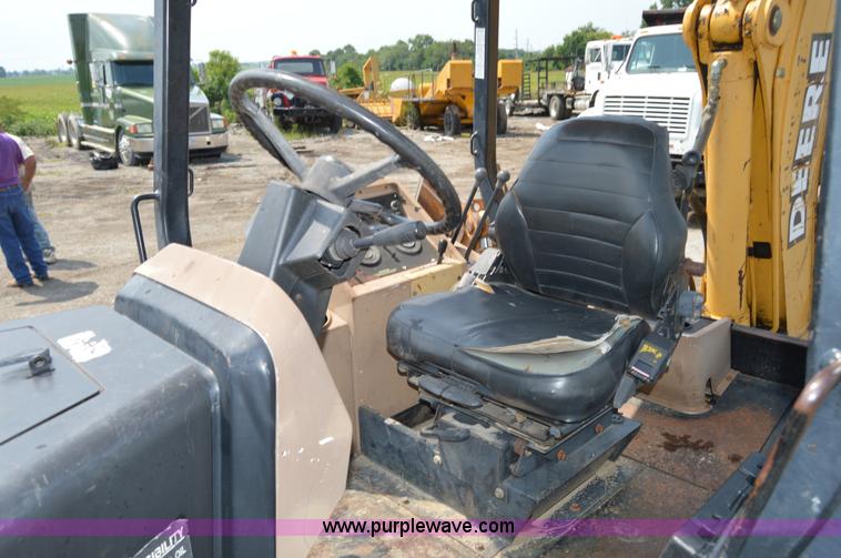 image for item H2828 1999 John Deere 310E backhoe