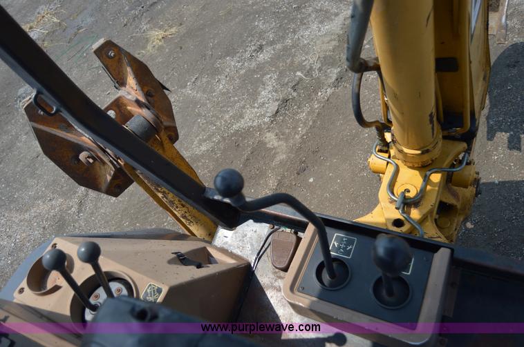 image for item H2828 1999 John Deere 310E backhoe