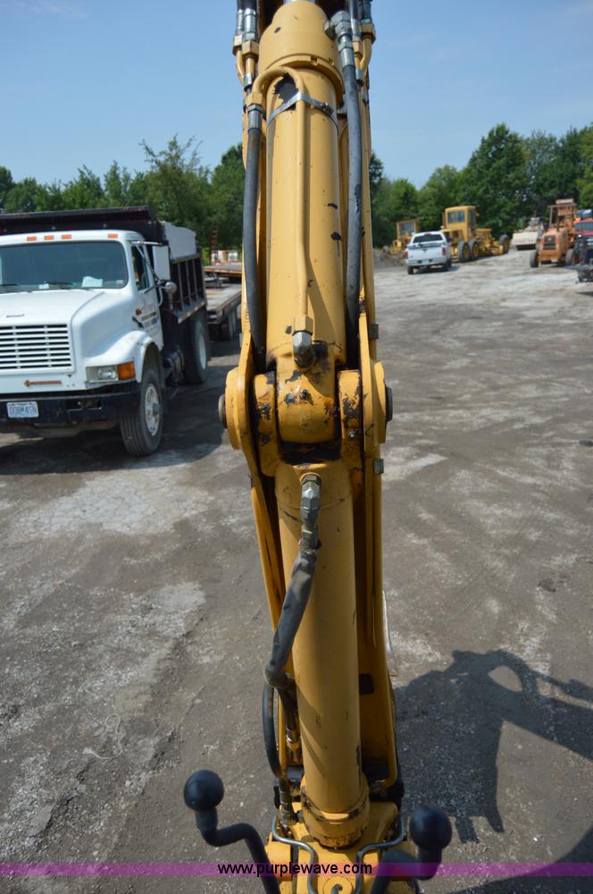 image for item H2828 1999 John Deere 310E backhoe