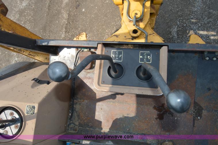 image for item H2828 1999 John Deere 310E backhoe