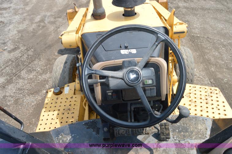 image for item H2828 1999 John Deere 310E backhoe
