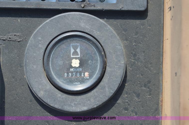 image for item H2828 1999 John Deere 310E backhoe