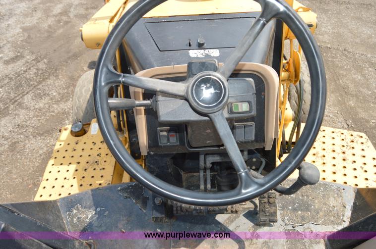 image for item H2828 1999 John Deere 310E backhoe