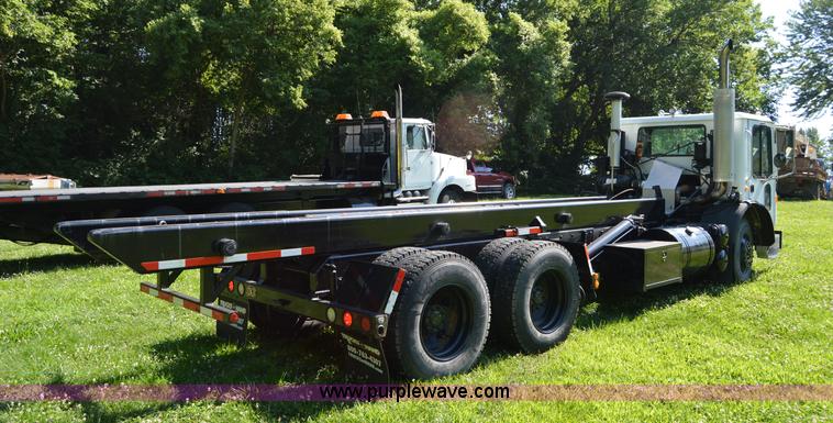 image for item H2874 1997 Mack MR688S roll off truck