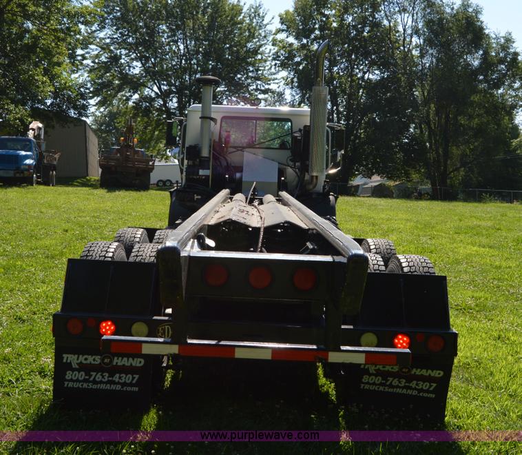 image for item H2874 1997 Mack MR688S roll off truck