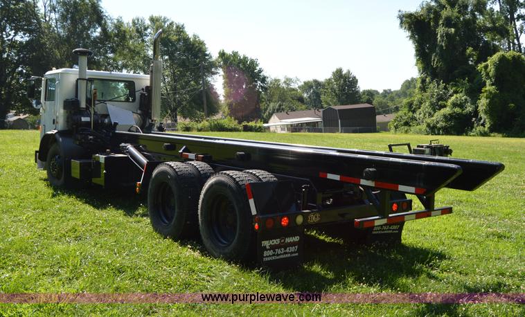 image for item H2874 1997 Mack MR688S roll off truck