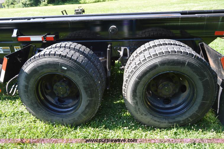 image for item H2874 1997 Mack MR688S roll off truck