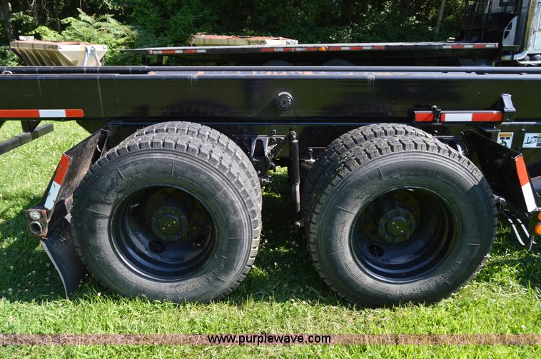 image for item H2874 1997 Mack MR688S roll off truck