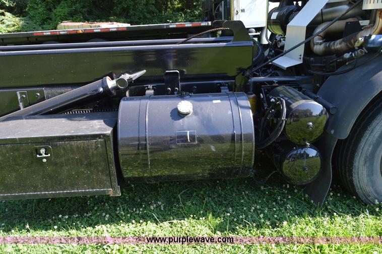 image for item H2874 1997 Mack MR688S roll off truck