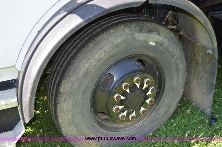 image for item H2874 1997 Mack MR688S roll off truck