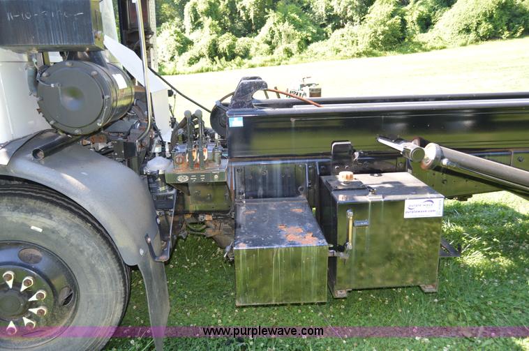 image for item H2874 1997 Mack MR688S roll off truck