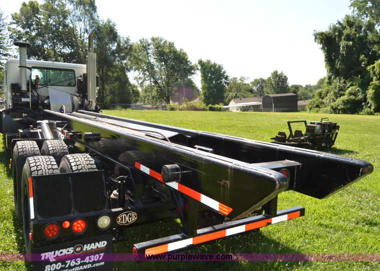 image for item H2874 1997 Mack MR688S roll off truck