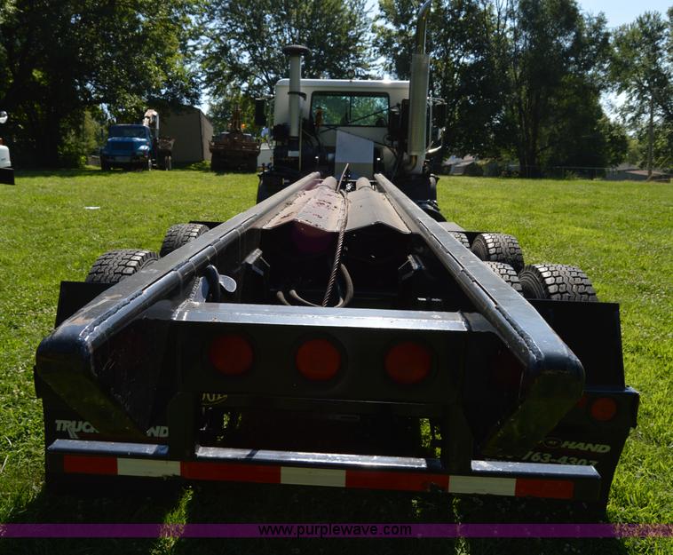 image for item H2874 1997 Mack MR688S roll off truck