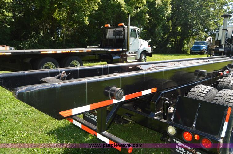 image for item H2874 1997 Mack MR688S roll off truck