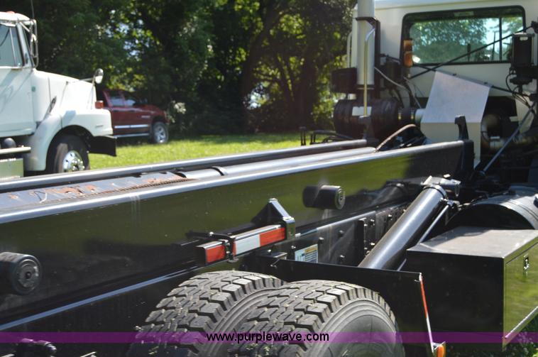 image for item H2874 1997 Mack MR688S roll off truck