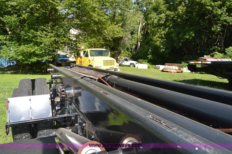 image for item H2874 1997 Mack MR688S roll off truck