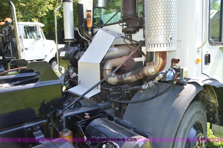 image for item H2874 1997 Mack MR688S roll off truck