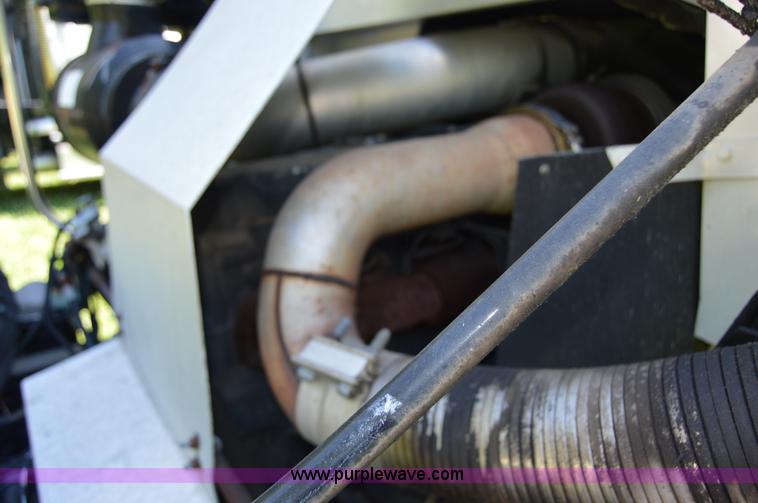 image for item H2874 1997 Mack MR688S roll off truck