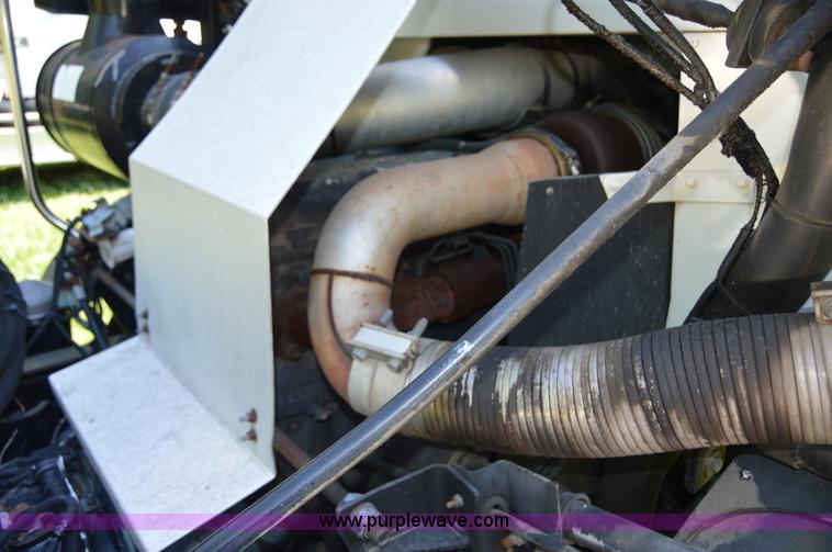 image for item H2874 1997 Mack MR688S roll off truck