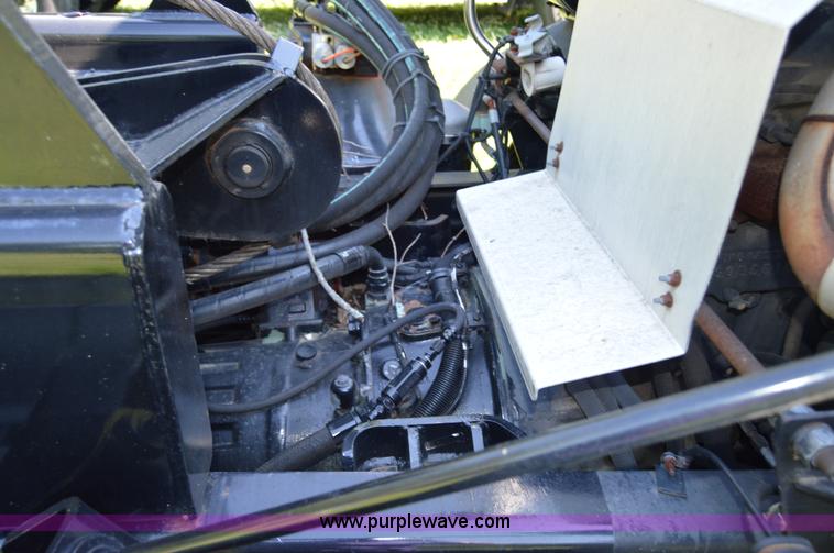 image for item H2874 1997 Mack MR688S roll off truck