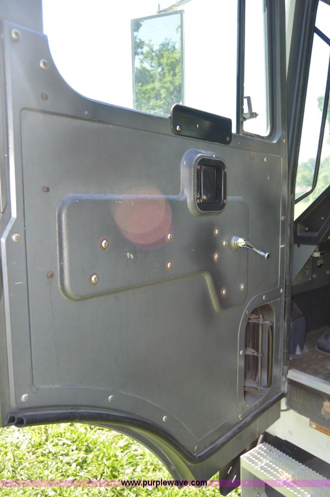 image for item H2874 1997 Mack MR688S roll off truck