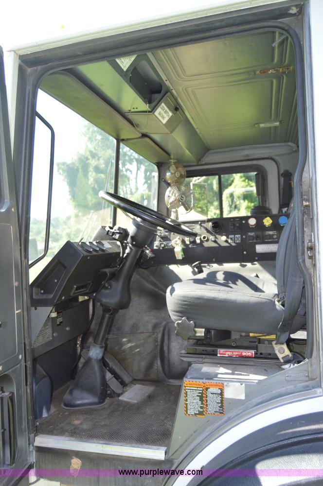 image for item H2874 1997 Mack MR688S roll off truck