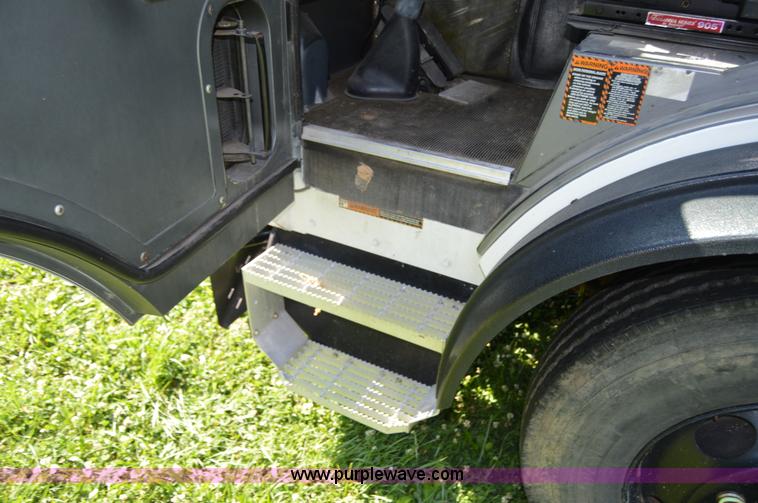 image for item H2874 1997 Mack MR688S roll off truck