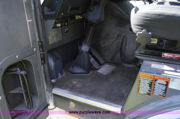 image for item H2874 1997 Mack MR688S roll off truck