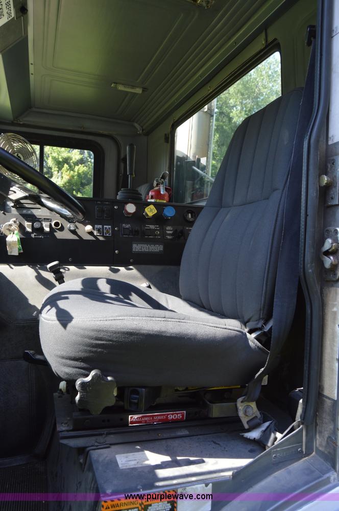 image for item H2874 1997 Mack MR688S roll off truck