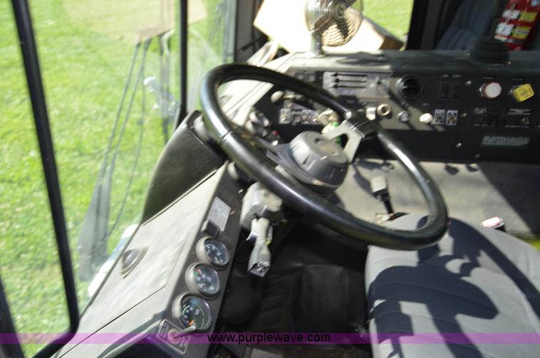 image for item H2874 1997 Mack MR688S roll off truck