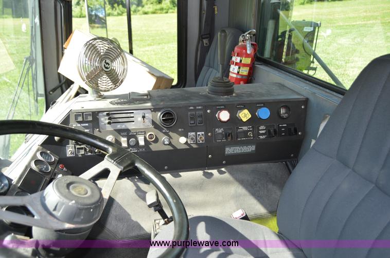 image for item H2874 1997 Mack MR688S roll off truck