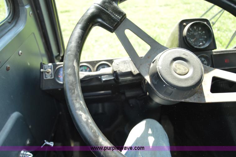 image for item H2874 1997 Mack MR688S roll off truck