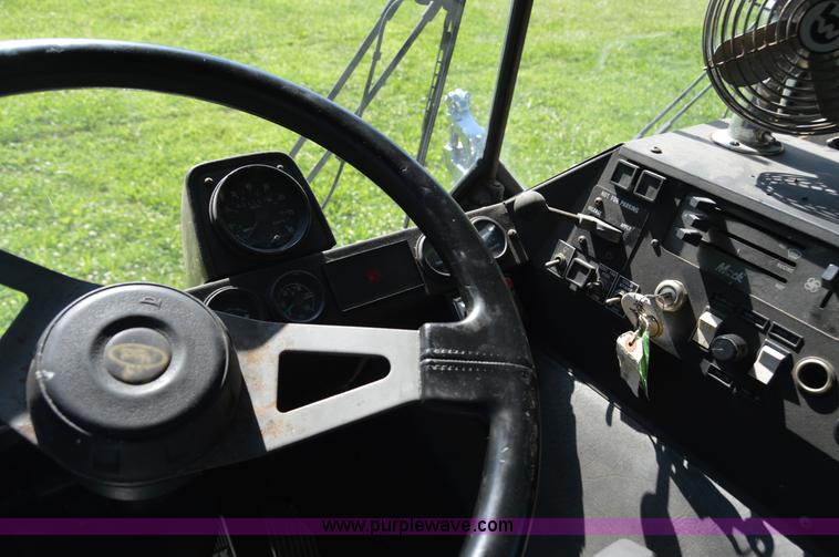 image for item H2874 1997 Mack MR688S roll off truck