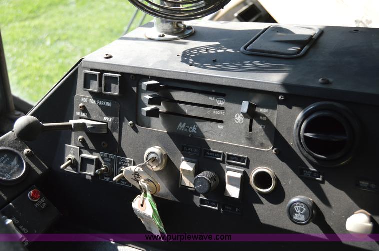 image for item H2874 1997 Mack MR688S roll off truck