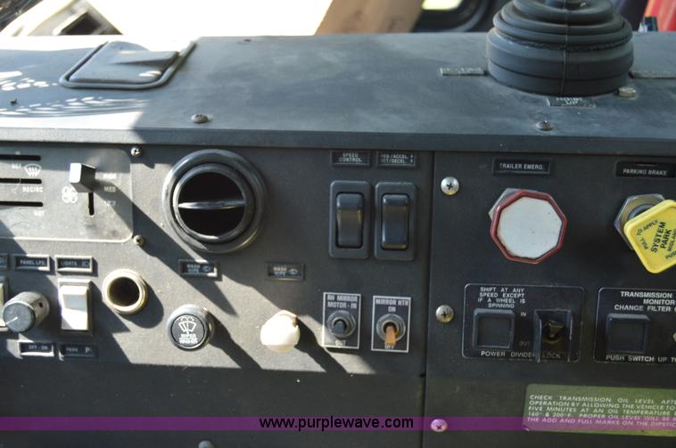 image for item H2874 1997 Mack MR688S roll off truck