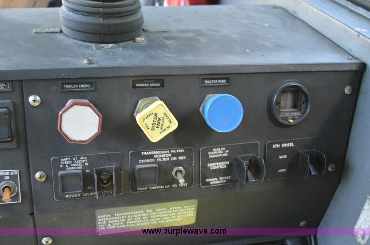 image for item H2874 1997 Mack MR688S roll off truck