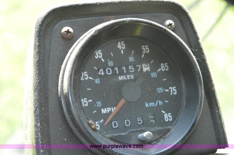 image for item H2874 1997 Mack MR688S roll off truck