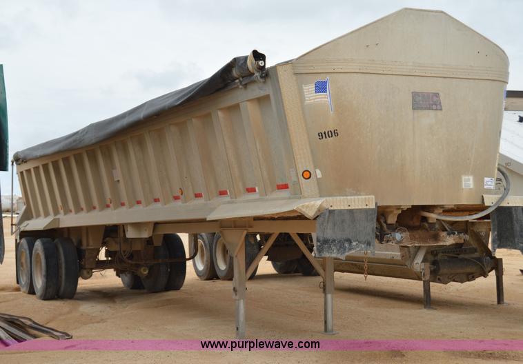 image for item H2974 2000 GMC Travis S/102 aluminum end dump trailer