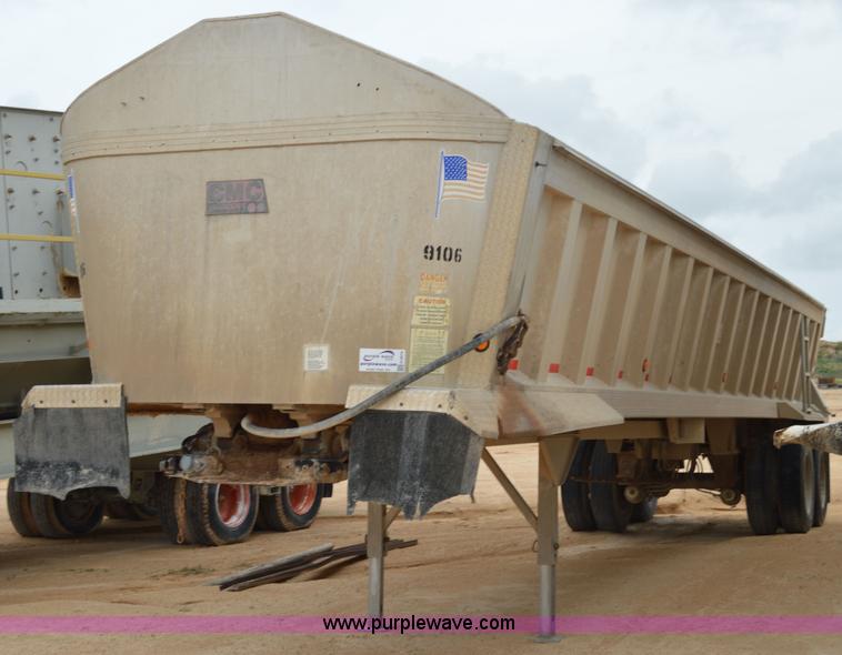 image for item H2974 2000 GMC Travis S/102 aluminum end dump trailer