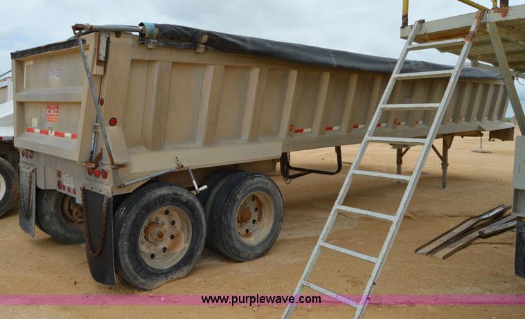 image for item H2974 2000 GMC Travis S/102 aluminum end dump trailer