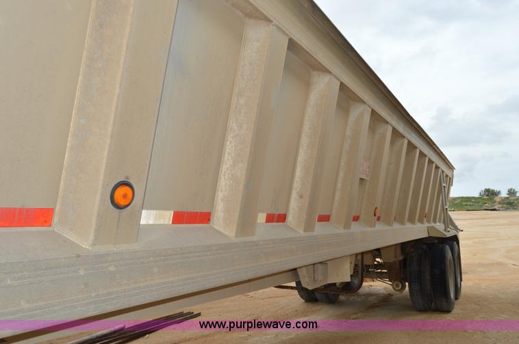 image for item H2974 2000 GMC Travis S/102 aluminum end dump trailer