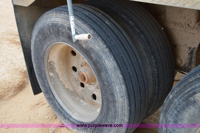 image for item H2974 2000 GMC Travis S/102 aluminum end dump trailer